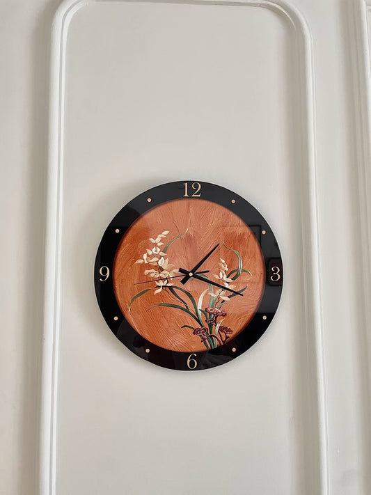 classic red clock with flower