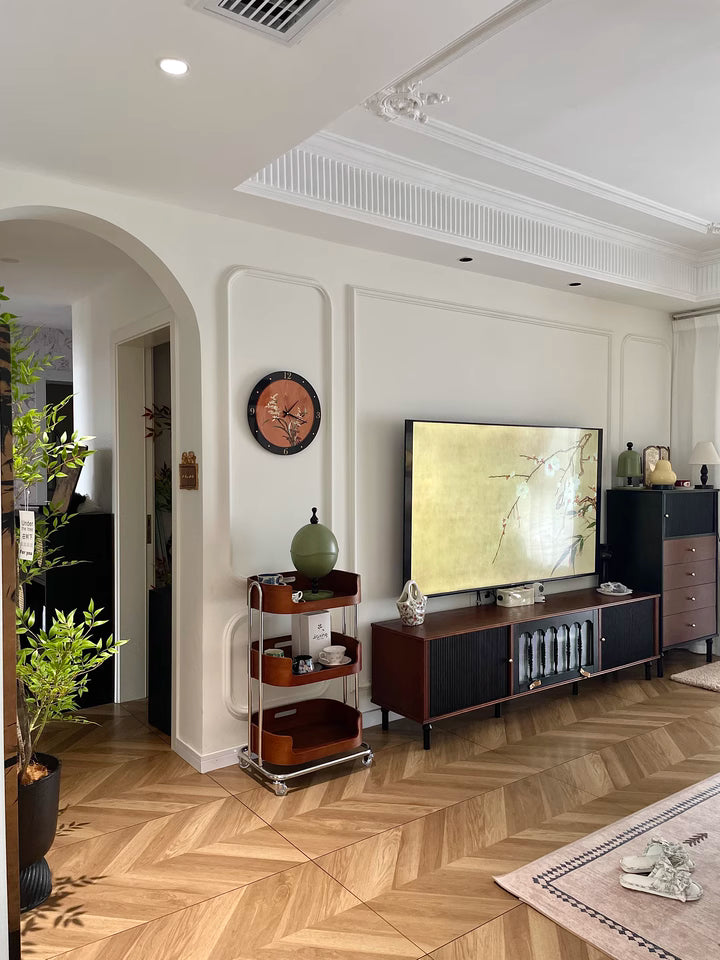 red clock with flower at living room