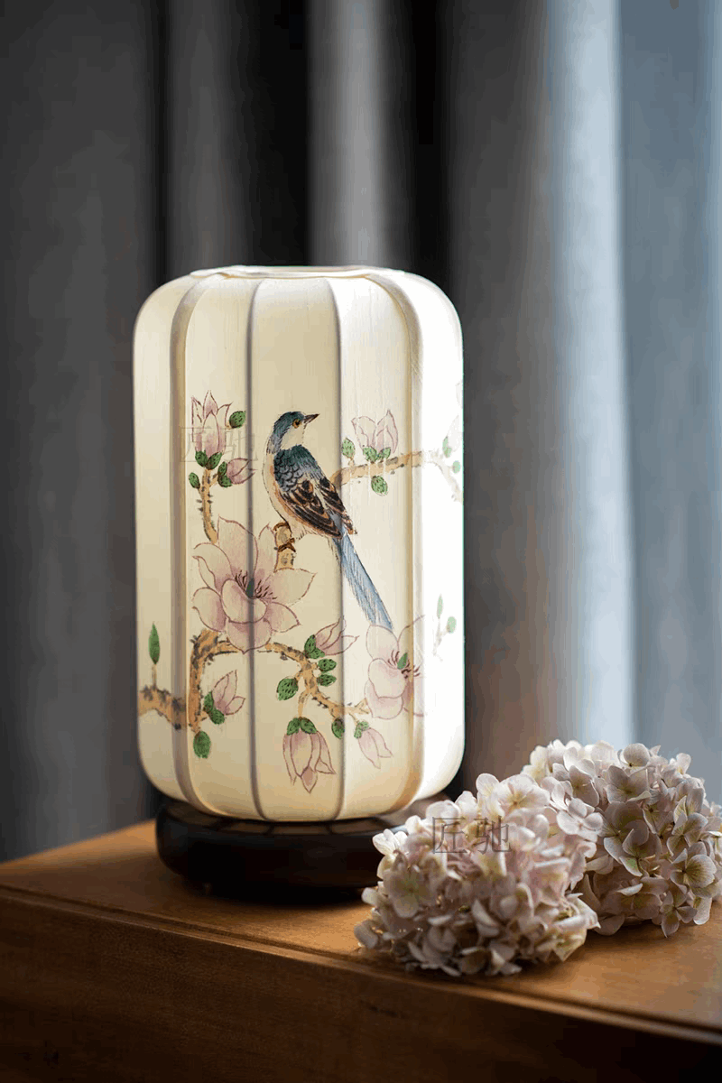 bird floral latern lamp near window