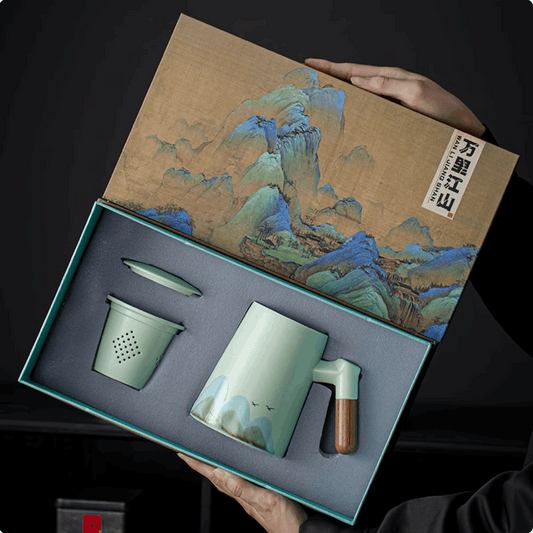 tea pot with tea filter and lit gift box