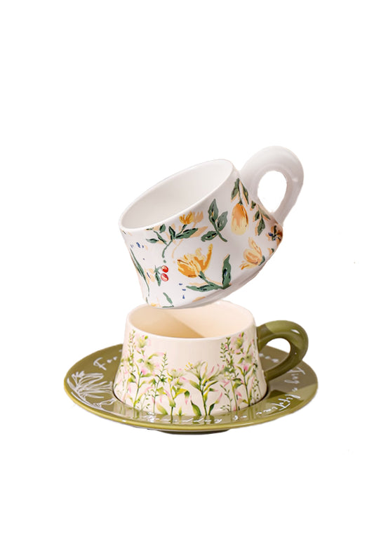 yellow floral cup on top of pink floral cup
