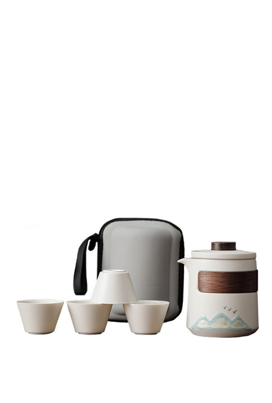 white teapot with white teacup
