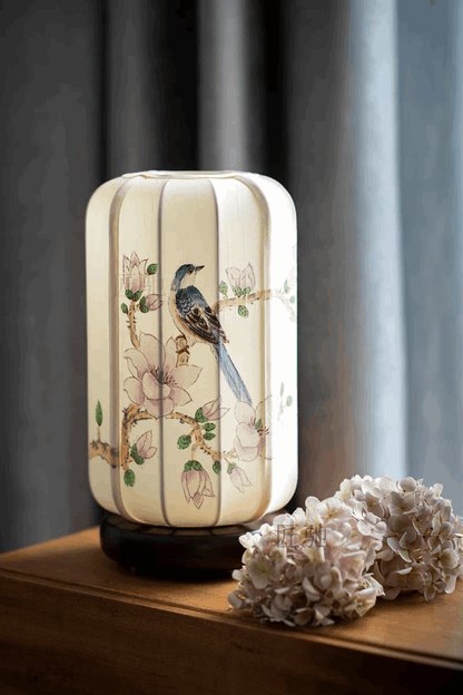 bird floral latern lamp near window