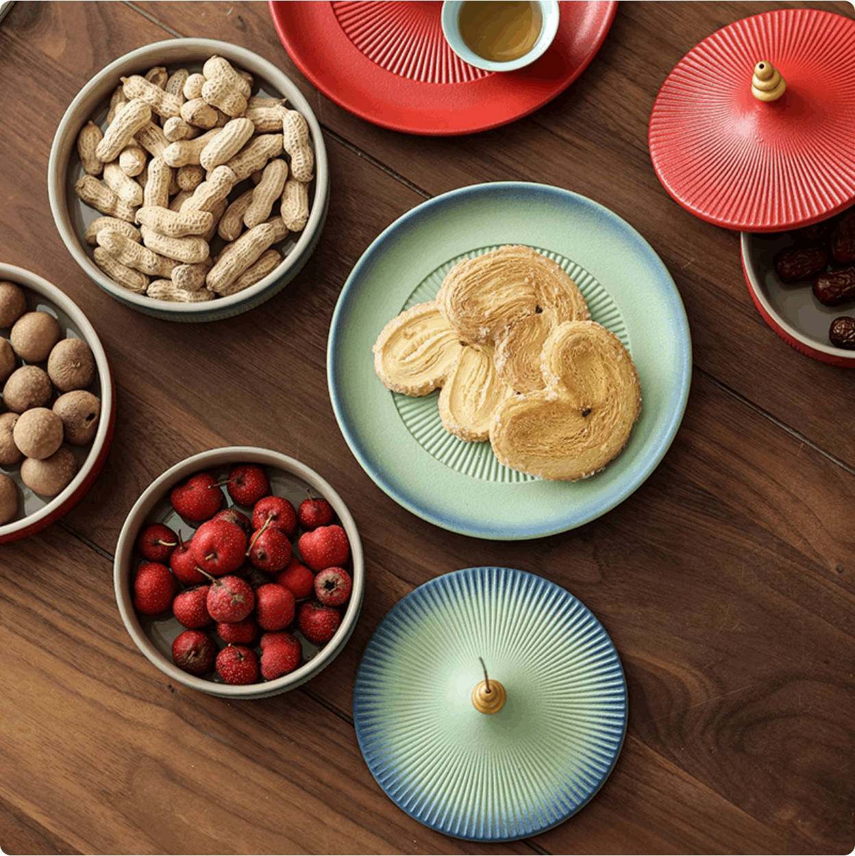 green serving platter on wooden table