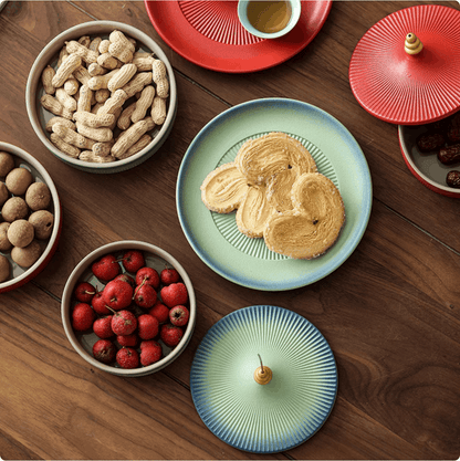 green serving platter on wooden table